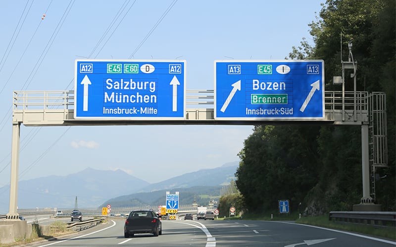 Can I cross the border between Germany and Austria in my hire car