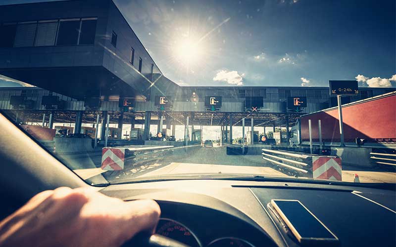 What are toll roads and how do I pay the tolls?